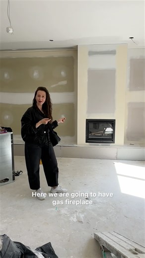 Luxury Melbourne townhouse feature wall with fireplace and tv joinery.