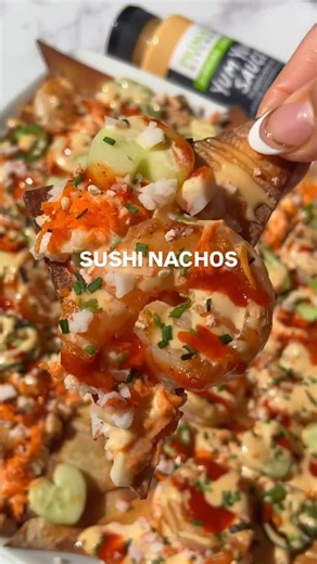 Sheila Williams on Instagram: "Spicy Shrimp Sushi Nachos | crispy wonton chips topped my favorite sushi toppings🥑 the perfect lunch, appetizer or easy weeknight dinner! •shrimp •avocado •cucumbers •surimi crab •grated carrots •yum yum sauce •sriracha sauce •furikake seasoning •jalapeños (optional) #sushinachos #pokenachos #easyrecipes #weeknightdinner #appetizers #nachos #quickrecipes #dinnerideas #snackideas"