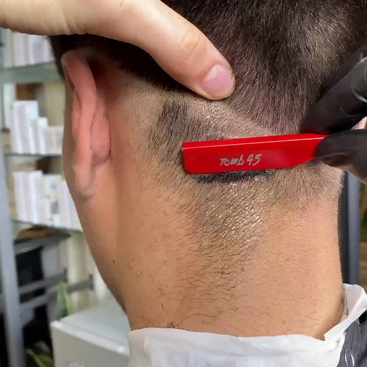 Expert Haircutting Techniques in a Modern Barbershop