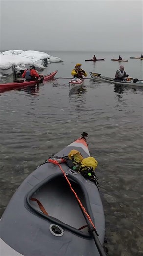 Pushing my Itiwit X500 into the water before going sea kayaking in winter