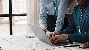 business documents businessman check legal document review Prepare documents or analysis reports, tax items, accounting documents, data contracts, office partner agreements.