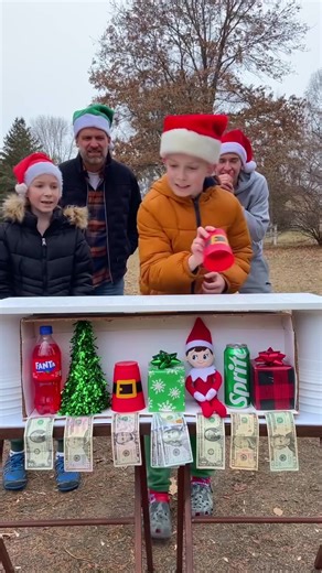 "The Christmas Season Matching Game 🎁 Dad, kids, and family play a Christmas party matching game with various holiday items like an elf on the shelf, Christmas tree, presents, and other red and green items. If they match the item correctly, they win a cash prize." 🎬 This video was produced by Network Media and Benson Bros | Play Together Stay Together