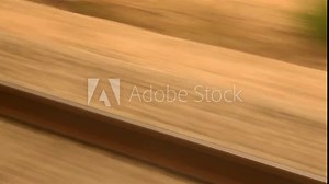 View from fast train window, rail in daylight Train Watching Railroad Tracks