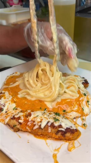 This CHICKEN VODKA PARMESAN TOPPED WITH FETTUCCINE ALFREDO from @elmstreetdiner in Norwalk & Stamford, CT is a MUST-DEVOUR!!! 🍗🧀🍝🔥🤤 #DEVOURPOWER #fyp #foryou #comfortfood #chickenparm