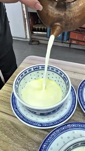 What strange chemical reaction will occur when ginger juice and milk are put together?