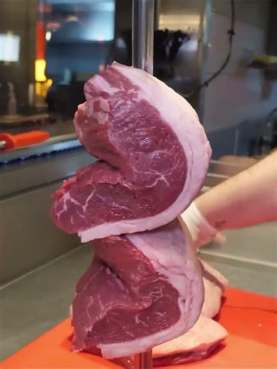 Stacking Meat on Skewer for Brazilian BBQ
