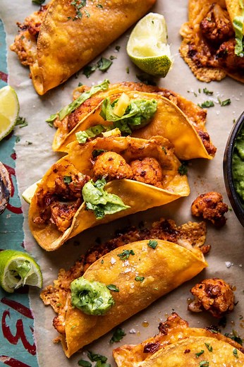 Crispy Cauliflower Tinga Tacos with Honey Lime Avocado Crema.