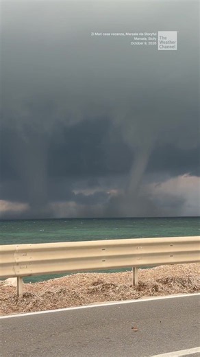 Rare twin waterspouts were captured on camera side-by-side off the coast of Marsala, a town in Sicily, on Friday, October 9.