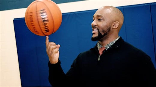 He grew as a person through basketball. Now he's coaching to 'help out our youth'