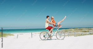 Couple in love enjoying free time on the beach together