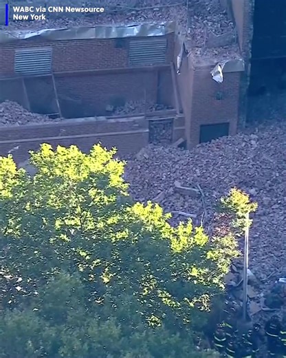 Part of a high-rise apartment building in New York City collapsed Wednesday morning, leaving a corner of the building a pile of rubble. | 6 News WOWT