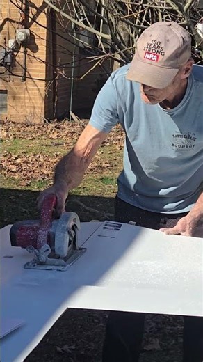 My dad cutting FRP Panel for my shower
