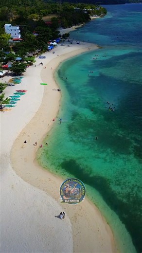Lambug Beach is a beautiful white sand beach in Badian, Cebu. 🌊 It has clear blue water, soft sand, and a calm view of the sea. It’s a great place to swim, relax, and enjoy the sunset. Many people visit Lambug Beach to unwind and feel close to nature. 🌴 | SEA HUNTERS