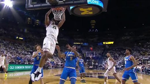 Morez Johnson Jr. rocks an alley-oop slam for Michigan