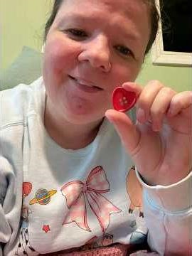 I got some cute heart buttons and fabric to add to my crochet heart bag.