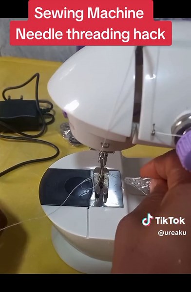How to thread a sewing machine needle. #sewing #sewingmachine #sewingmachinetips #threading #thread #minisewingmachine #minisewingmachinetutorial #minisewingmachinethreading