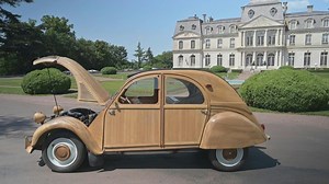 A car made out of wood -- that is the challenge carpenter-joiner and car enthusiast Michel Robillard set himself in 2011. His unique Citroen 2CV, with a body entirely made out of fruit trees, will soon go under the hammer, fetching an estimated price of 150,000 to 200,000 euros. | AFP News Agency