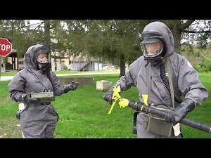 Women in chemical protection + panoramic gas mask. Comfortable protective suits. Женщины в химзащите