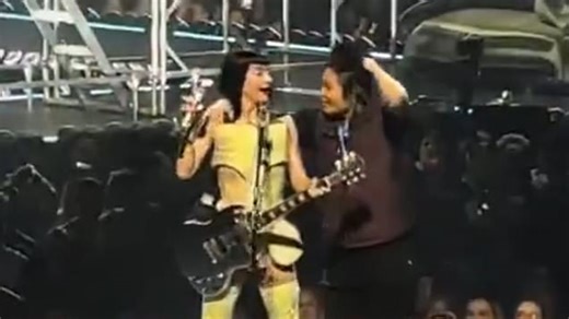 Katy Perry looks furious after fan storms the stage at her show