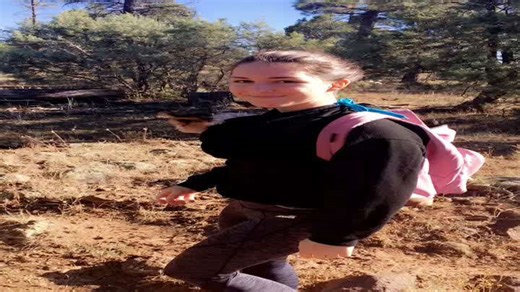 Woman Hikes With Pup Snuggled in Her Shirt