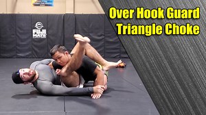 For MMA, playing guard is not always the best or safest strategy. It's easy to end up stuck in your guard and getting ground and pounded. For this reason, I like using the over hook guard, especially in MMA. From the over hook, it is difficult for your opponent to strike - even head butts are off the table. It's also perhaps the best striking position for the guard player, as they have easy access to elbows to the head. However, there are a lot of great attacks from the over hook guard, especial