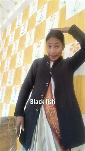 Rhyming the poem with action ...One fish, two fish, red fish, blue fish