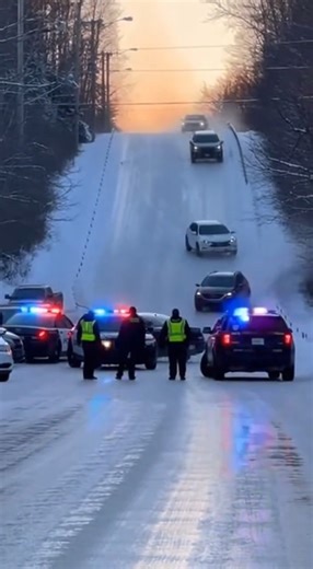 On February 17, 2026, in Duluth, Minnesota, multiple police vehicles responding to icy road conditions were captured sliding down a steep hill during a winter storm. Dashcam footage showed patrol cars losing traction and gradually drifting downhill before colliding with other police vehicles that had been positioned to block the roadway. Officers were seen stepping aside as the vehicles slowly made contact on the slick surface. Authorities later confirmed no serious injuries were reported, thoug