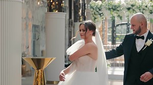 Wedding dance of the bride and groom on their wedding day. The groom holds the hand of the bride and picks her up in the dance. the image of shared happiness and love.