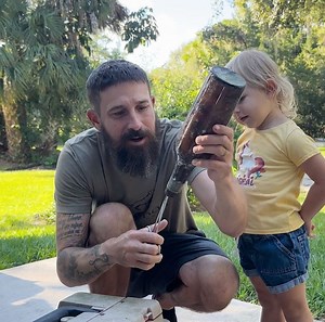 72K views · 1.1K reactions | I spot this old bottle floating by, pop it open, and boom straight-up Everglades voodoo. Somebody put a curse on a lady… photo inside, eyes scratched out, the whole deal. | Python Cowboy Hunts | Facebook