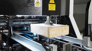 The ZK-660FC Rigid Box Making Machine redefines industrial manufacturing with its cutting-edge technology and advanced manufacturing systems. Featuring a servo control system, programmable motion control, and photoelectric servo positioning, this precision machine ensures seamless automation. From paper feeding to folding and forming, all processes are completed with unmatched efficiency at up to 35 pcs/min. Designed for durability and low noise, it meets the demands of manufacturing machines fo