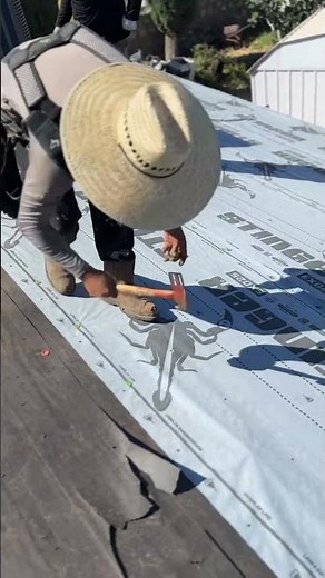 Young Roofer Securing Synthetic Underlayment Like a Pro! 💪 #roofing #construction