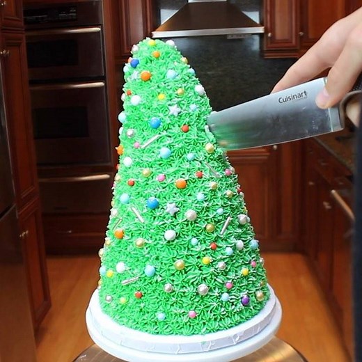 I finished off the Christmas cake with all sorts of decorative sprinkles!🎄🤩And the inside is the best part! The full tutorial for this cake will be on my YouTube Channel Soon!🎥 | Baking with Ryan