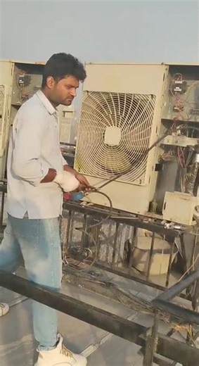 HVAC Technician from India Ready for Deployment AC Condenser Unit Jet Cleaning