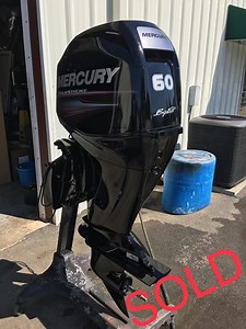$4395 Clean Used 2015 Mercury 60 HP 4 Cylinder 4 Stroke 20" Bigfoot Outboard Motor. Model number 60EXLPTCT (1A60563BZ) (lower unit converted from 25" to 20"). Serial number 1C389358. Weight - 270 lbs. 205-210 psi compression on all 4 cylinders. Power Trim. Electric Start. Only 161.4 hours logged on the computer. There is a crack on the hood, but is cosmetic only (see photo). Water Pump checked and is in excellent condition. New Spark Plugs, Oil Filter, and Fuel Filter. Used in Freshwater only. M