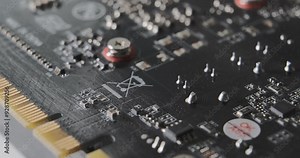 Exploring the complex layout and components on a circuit board with close-up views of soldering and connections.