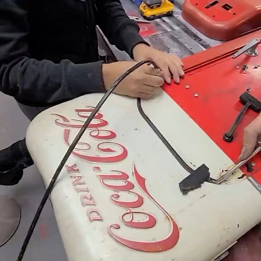 Ray Hewitt, the owner of Soda City Restorations, restores and replaces vintage soda machines. It takes about 60 hours of work to complete and involves disassembling, painting, and reassembling the machine. The resale value of the Coca-Cola Vendo 44 is about $8,000. | Insider Design