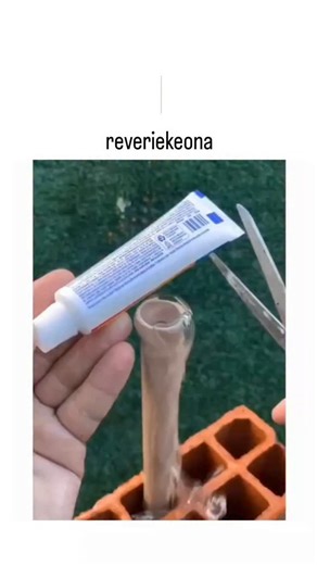 buzz__decode on Instagram: "The post features a 64-second video demonstrating a DIY hack: cut the end off a nearly empty toothpaste tube, insert a straw for a spout, and wrap rubber bands around the body to roll and dispense remaining paste easily. Garnering 1 million views and 412 likes within hours, it sparks Indonesian-language replies questioning if the effort justifies saving a small amount, reflecting common debates on minor waste reduction. This technique addresses documented waste, where