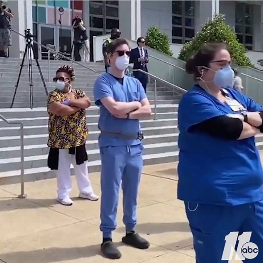 PROTESTERS VS HEALTHCARE WORKERS: Healthcare workers have arrived and are standing across the street from protesters during the ReOpen NC protest in downtown Raleigh https://abc11.tv/2yR7Nvj | ABC11 WTVD