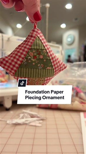 How precious is this scrappy foundation paper piecing Christmas ornament?! It was my first attempt at FPP, but I think I did pretty good! Excited to find some free patterns to practice more! #foundationpaperpiecing #christmas #sewingpattern #christmasdecor #diyornaments