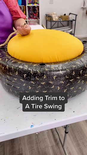 Adding trim to your tire swing. #TrashToTreasure #tireswingfun #tireswing #backyardvibes #diy#swings#tireupcycling#makeadifference2022