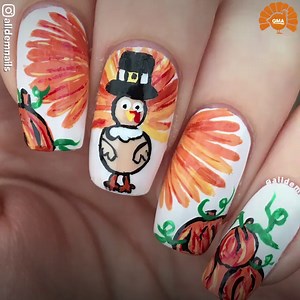 Get in the fall spirit with these Thanksgiving-themed nails