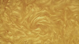 Swirling golden liquid background - Free Stock Video
