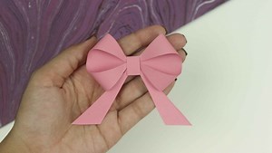 2.9K views · 21 reactions | How to Make A Paper Bow - How to Fold A Paper Bow - Easy Paper Bow Step by Step Paper Decoration DIY | How to Make Simple Easy Bow  | QUICK & EASY For Gift Wrapping #paperbow #paperbowtutorial #simpleeasybow #easygiftwrapping #howtomake #papercraft #decorationideas #howtomake | Ezzy Crafts DIY | Facebook