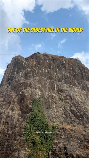 Vishal Gupta | Engineer The Explorer😎 on Instagram: "Gilbert Hill, Mumbai 📍 ONE OF THE OLDEST HILL IN THE WORLD . There are just three Basalt Rock Mountains in the world that are 66 millions years old. 1. Devil’s Postpile in California 2. Devil’s Tower in Wyoming 3. Gilbert Hill in Andheri, Mumbai (India)🇮🇳 . Gaondevi Mandir is one of the two temples built atop the Gilbert Hill, a 225 foot high monolith structure in the Andheri West area of Mumbai formed over 65 million years ago from the de