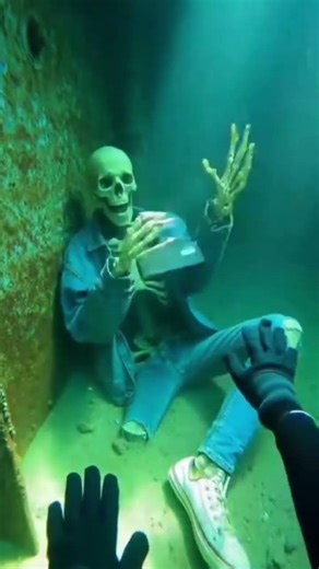 The Last Selfie: Skeleton with GoPro Collapses Underwater.
