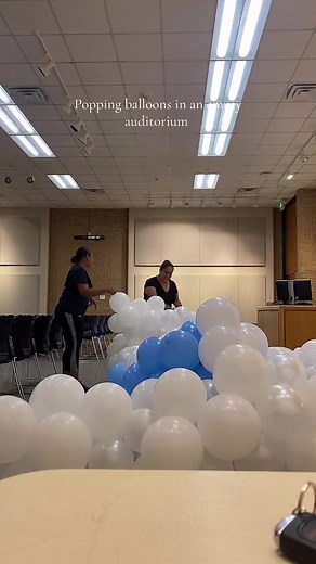 Popping balloons in an empty auditorium #asmr #asmrsounds #balloonpopping #echo