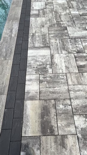Stone Creations of Long Island ©️ on Instagram: "Walk with me ! What really makes Cambridge Pavers stand out is what you don’t see—these pavers are built to handle freeze-thaw conditions, heavy use, and years of weather without shifting or fading when installed correctly. That’s why our base prep and grading are just as important as the pavers themselves. A solid foundation ensures this patio stays level, drains properly, and looks great for the long haul. We’re down to the finishing touches now