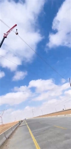Safe Execution of HVDC Line Crossing Over 132 kV Live Line and Road #Facebook #facebook #SafetyFirst #community @topfans | Electrical Transmission line