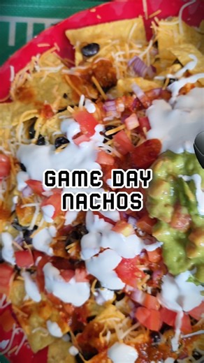 The Snack That Wins Every Watch Party Ingredients: 2 cups Cheese Cheddar & Monterey Jack (Mix) 1 bag tortilla chips 1 can black beans, drained and rinsed 1/2 cup sour cream 1/4 cup salsa 1/4 cup guacamole 1 small red onion, diced 1 small tomato, diced 1/4 cup sliced black olives Preparation: Preheat the oven to 350°F. Spread half of the tortilla chips evenly on a large baking sheet or oven-safe dish. Sprinkle half of the Cheese over the chips. Layer half of the black beans and add half of the to