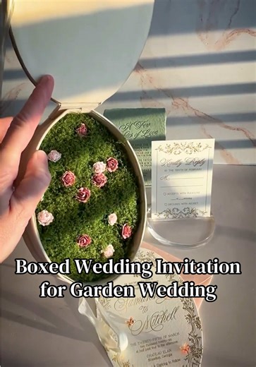 An oval box invitation crowned with laser-cut lattice and 3D butterflies — metallic paper, handmade texture, foil, and letterpress in perfect balance. #luxurystationery #fineartwedding #invitationdesign #letterpresslove #hazelwoodpaperco